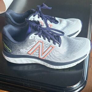 New Balance White and Navy Running Shoes with Orange Accents